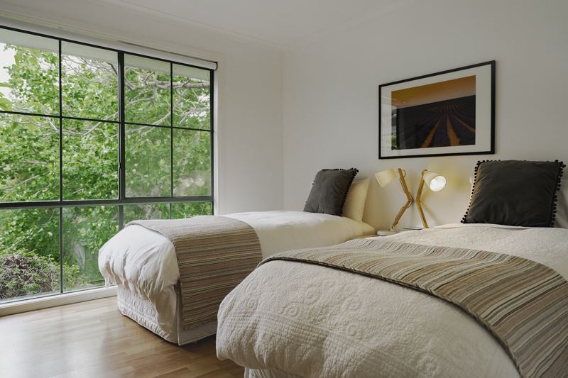 Twin beds by the window