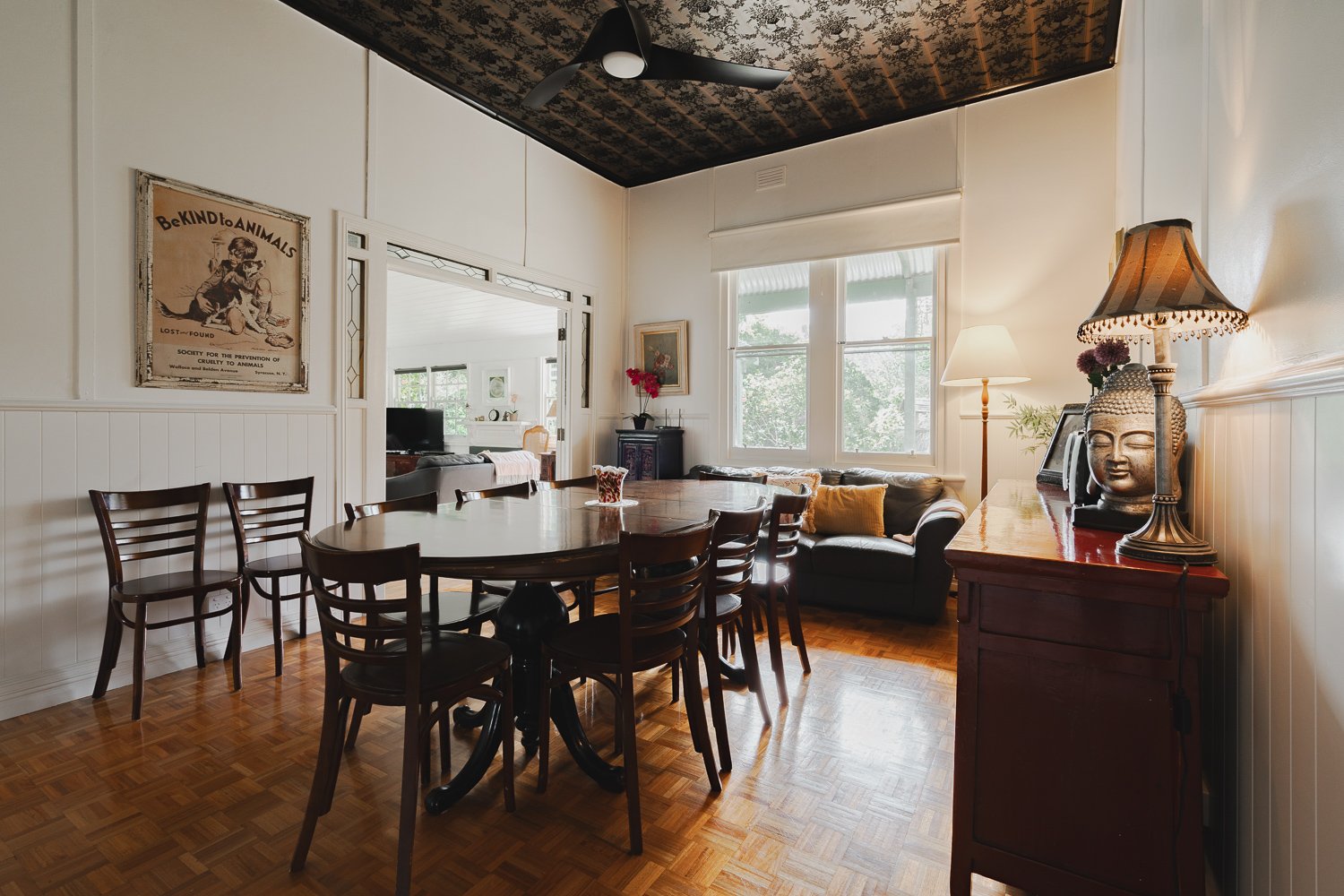 Dining room with pressed-metal ceiling