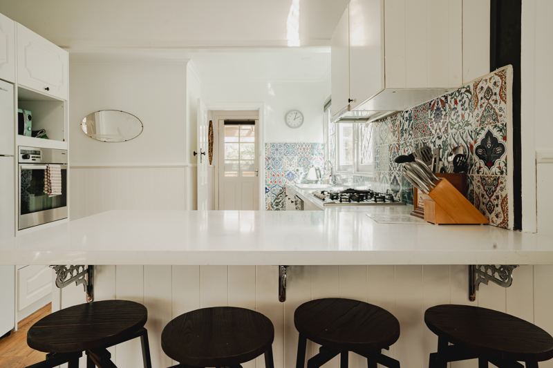 The kitchen bench and stools