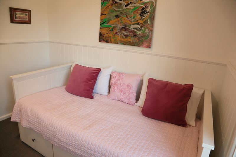 A daybed in the garden room