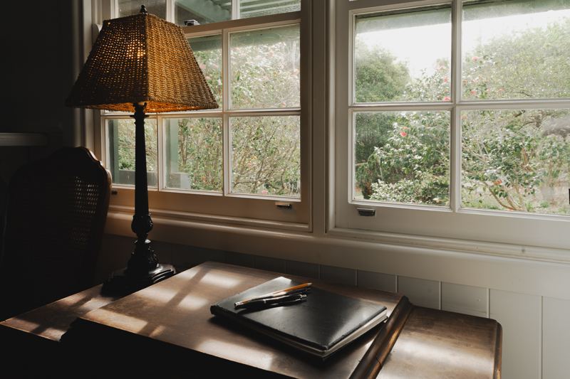 A writing desk by the window