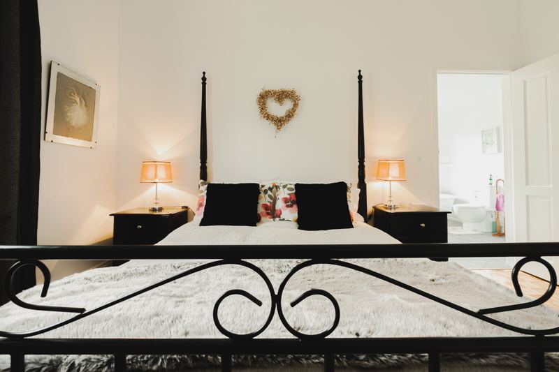 The four-poster bedroom at White Rose Cottage